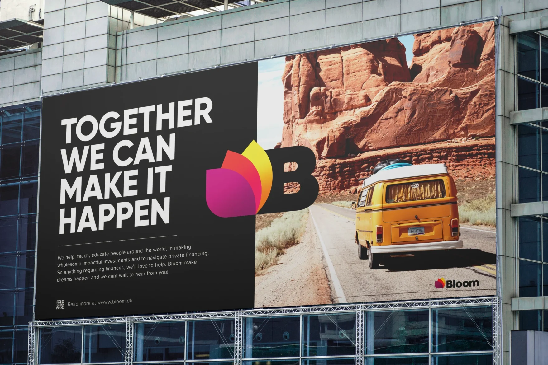 A Billboard ad, with Bloom's branding, and an auto camper going through a desert canyon.