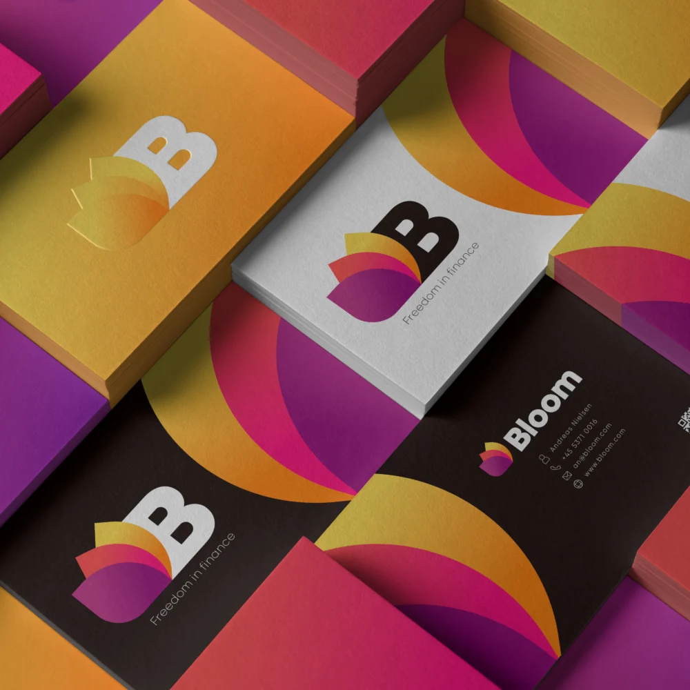 A mesh of business cards, with the Bloom branding. It is in the different colors that match the colors in Bloom's visual identity